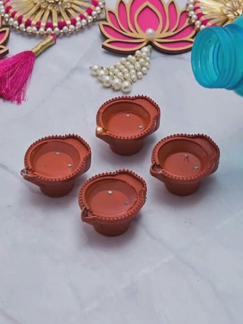 Water sensor diyas lighting up when water is poured
